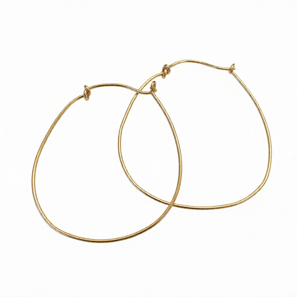 Gold horseshoe hoop earrings from Chorthip featuring a sleek, rounded design with a secure clasp and polished finish.