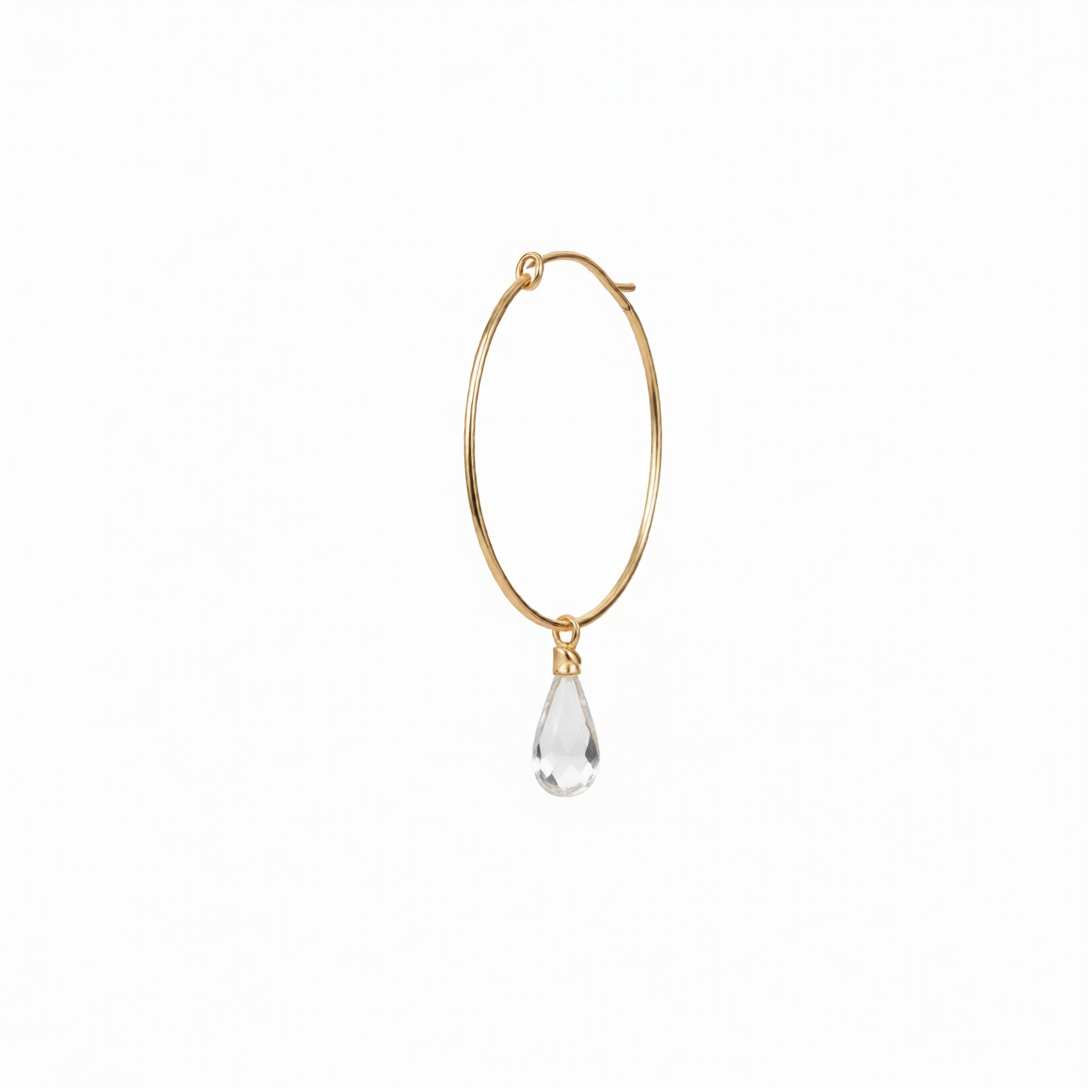 Round knot hoop earrings by Chorthip featuring sparkling white topaz stones on polished metal hoops.