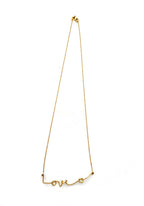 Love Knot necklace by Chorthip featuring a delicate intertwined heart-shaped pendant on a silver chain.