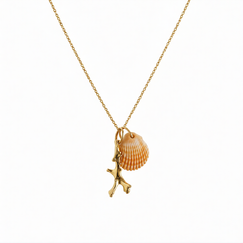 Gold coral pendant from Chorthip featuring a textured coral design on a sleek gold chain.