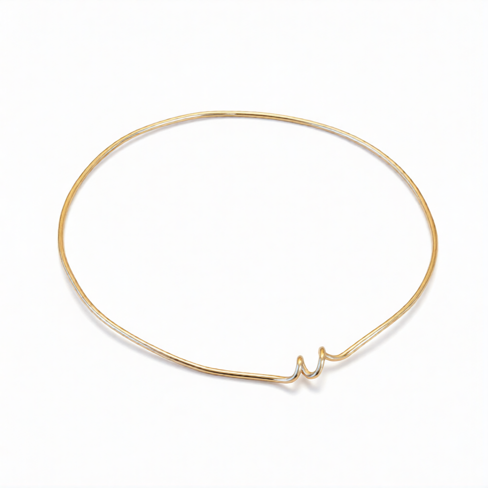 Chorthip Helix Spiral Bangle earrings featuring twisted metal design with a sleek, modern spiral shape in silver tone.