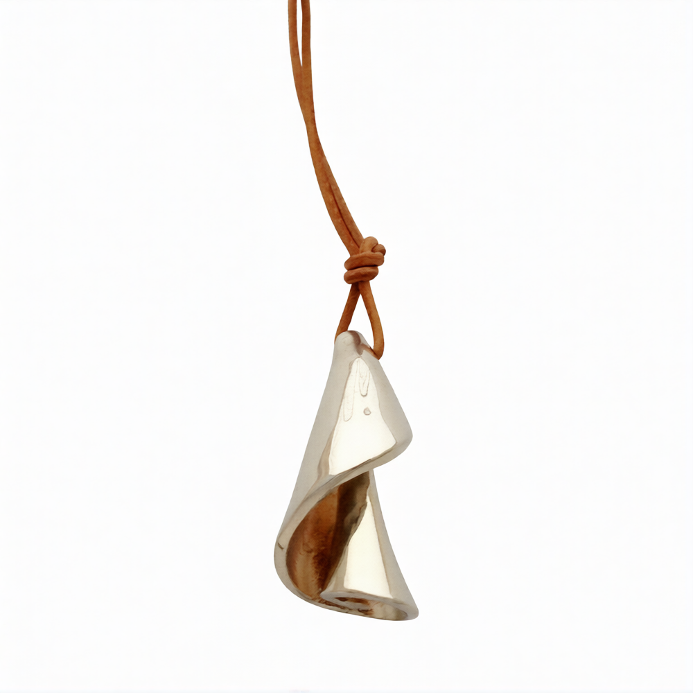 Chorthip Spiral Shell Pendant with intricate spiral design, hanging on a silver chain, showcasing natural shell texture and craftsmanship.