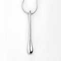 Chorthip Raindrop Pendant hanging on a chain, close-up view showing its sleek, shiny teardrop-shaped design and polished surface.