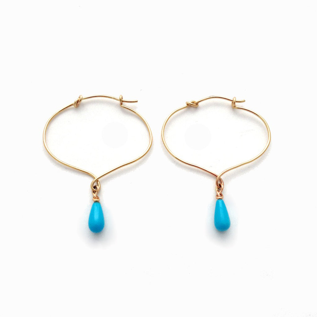 Chorthip lotus knot hoop earrings with dangling Sleeping Beauty turquoise drop stones, elegant jewelry for pierced ears.
