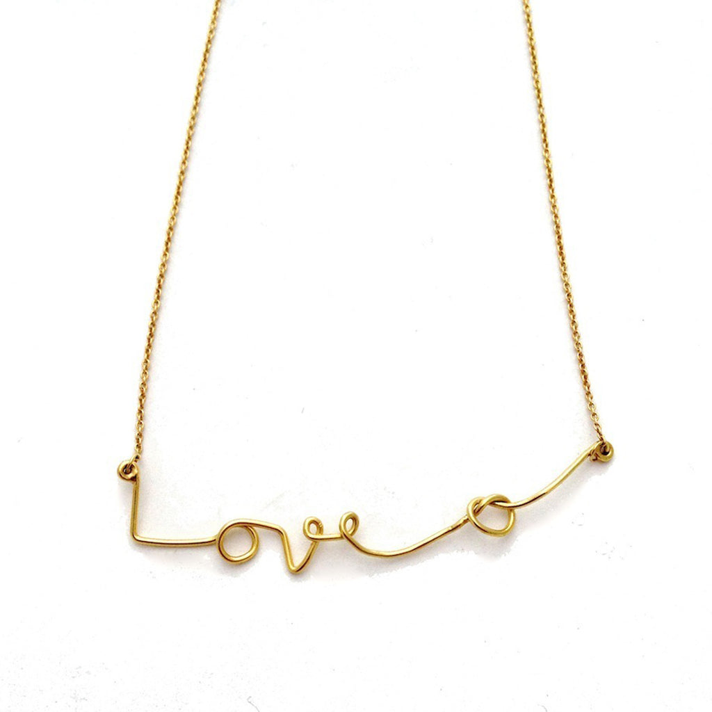 Gold Love Knot Necklace by Chorthip with intertwined heart-shaped design on a delicate chain.