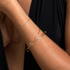 Chorthip single knot bangle made of sleek metal, showcasing a minimalist design with smooth, polished finish.