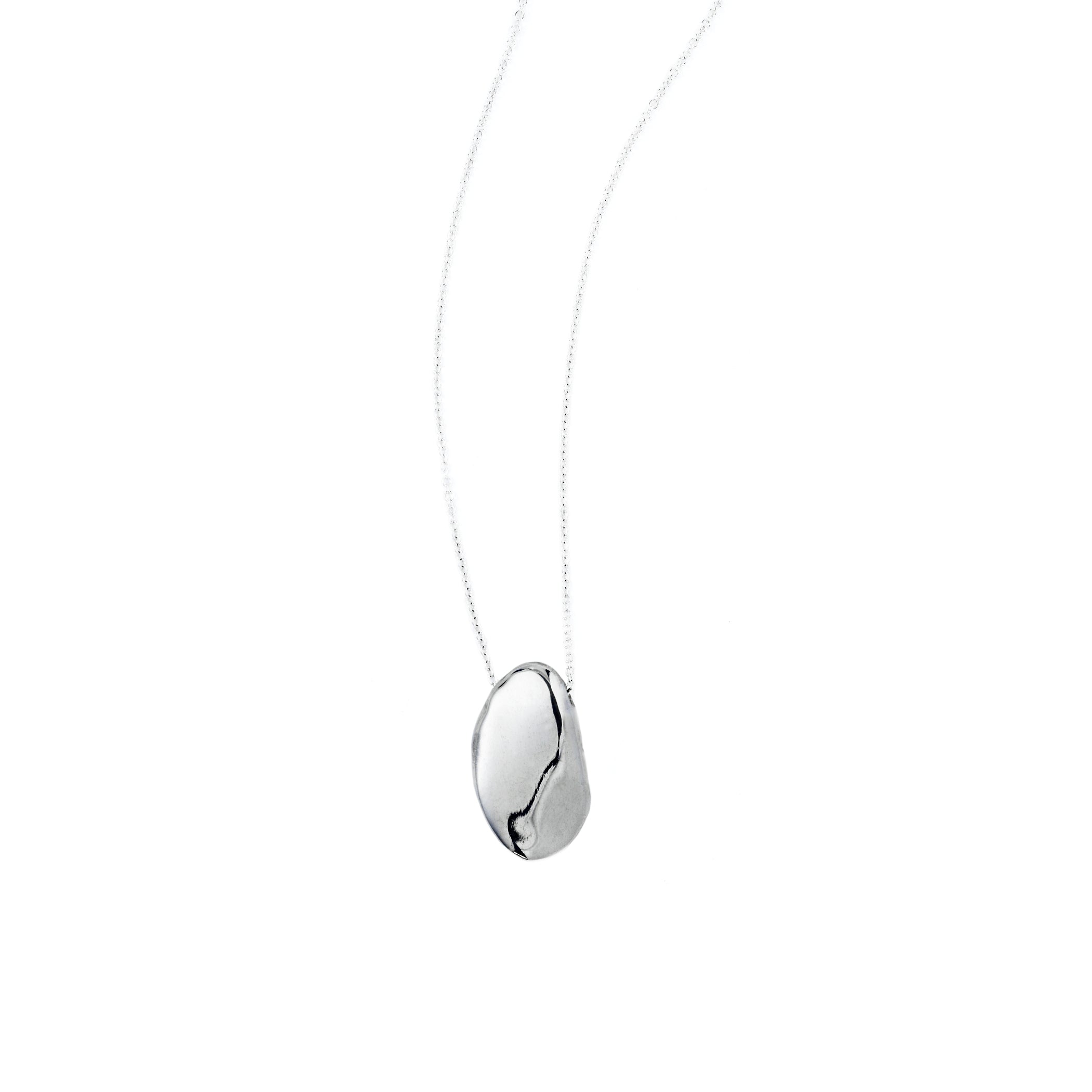 Chorthip Pebble Stone Pendant featuring a smooth, rounded stone design on a delicate chain.