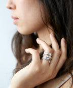 Silver Raindrop Ring by Chorthip featuring a sleek, teardrop-shaped design with a polished finish.