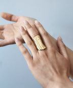 Gold Leaf Ring by Chorthip featuring a delicate leaf design in polished gold, perfect for elegant jewelry collection.