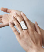 Silver Leaf Ring from Chorthip with intricate leaf design, crafted in sterling silver, displayed on a neutral background.