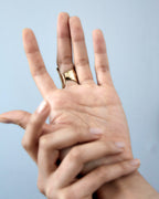 Gold Leaf Ring by Chorthip featuring a delicate leaf design in gold, perfect for elegant jewelry styling.