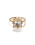 Elegant Arisa Rose engagement ring by Chorthip featuring a delicate rose-shaped design and sparkling center stone.