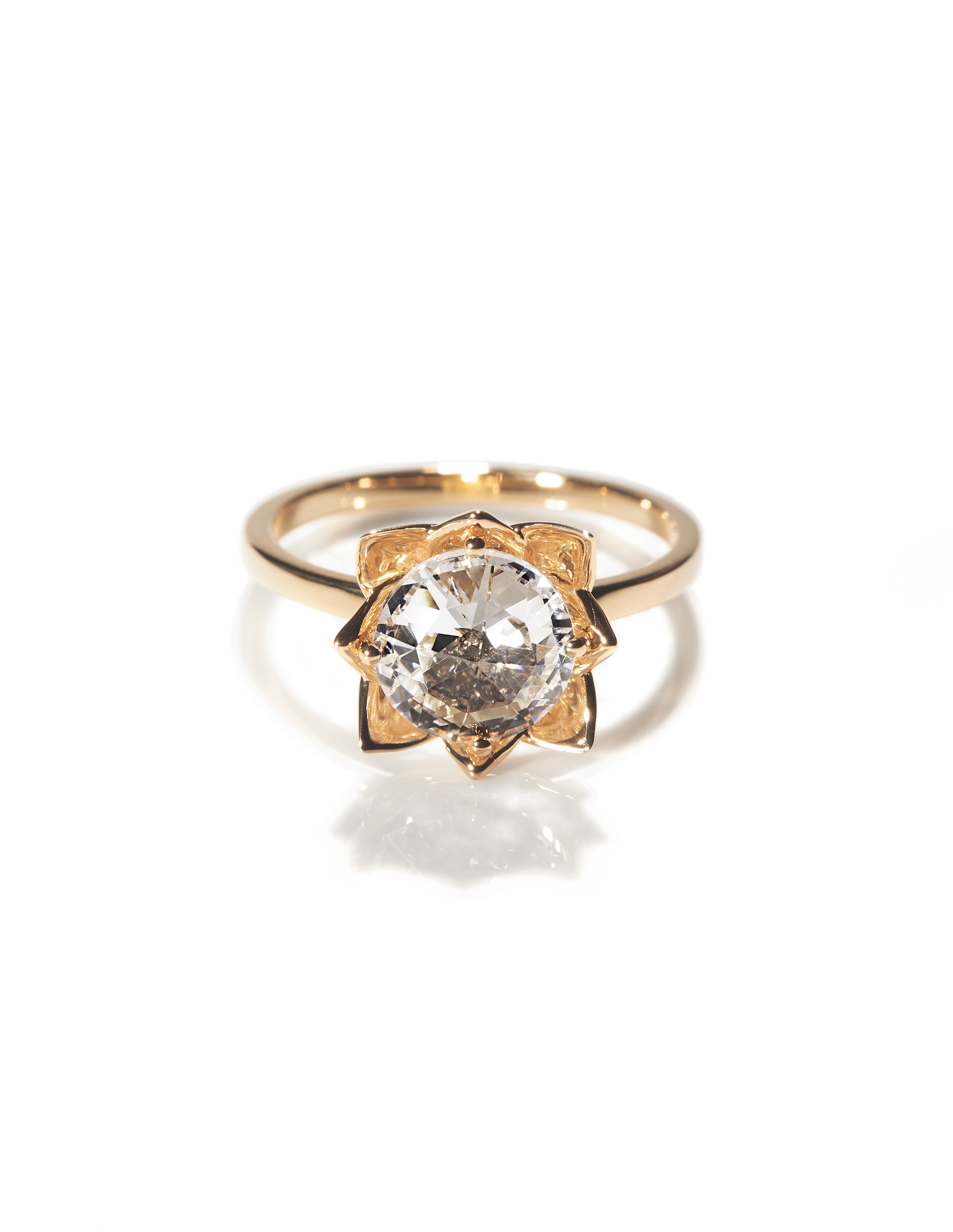 Elegant Arisa Rose engagement ring by Chorthip featuring a delicate rose-shaped design and sparkling center stone.
