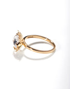 Elegant Arisa Rose Engagement Ring by Chorthip featuring a delicate rose design and sparkling band on a white background.