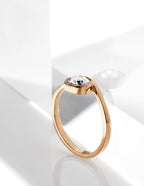 Elegant Arisa Wave engagement ring by Chorthip featuring a sleek band with wave-inspired design and sparkling gemstone.