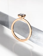 Elegant Arisa Simplicity Engagement Ring by Chorthip featuring a sleek band and minimalist design.