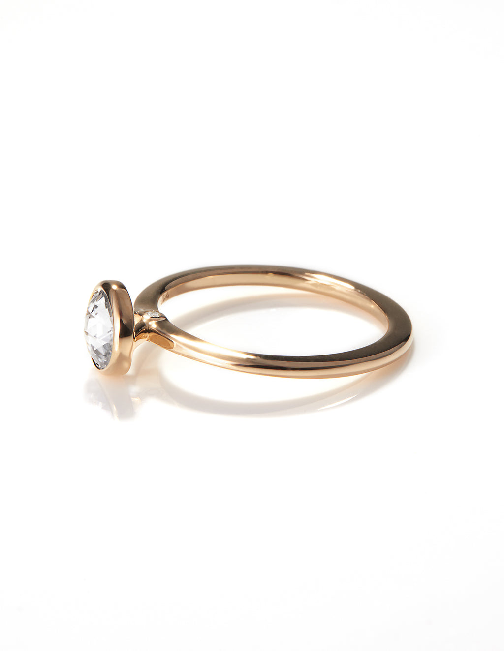 Elegant Arisa Simplicity Engagement Ring by Chorthip featuring a sleek band and minimalist design in the image.