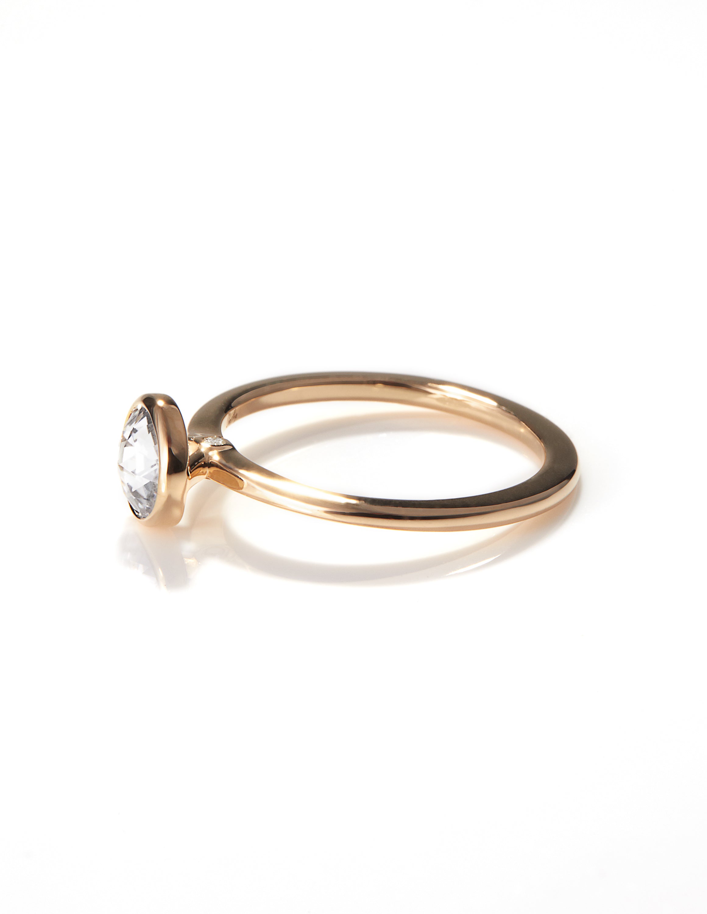 Elegant Arisa Simplicity Engagement Ring by Chorthip featuring a sleek band and minimalist design in the image.
