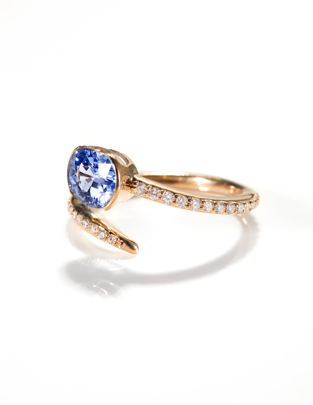 Elegant Arisa Serpentine Engagement Ring by Chorthip featuring a twisting band with intricate detailing.