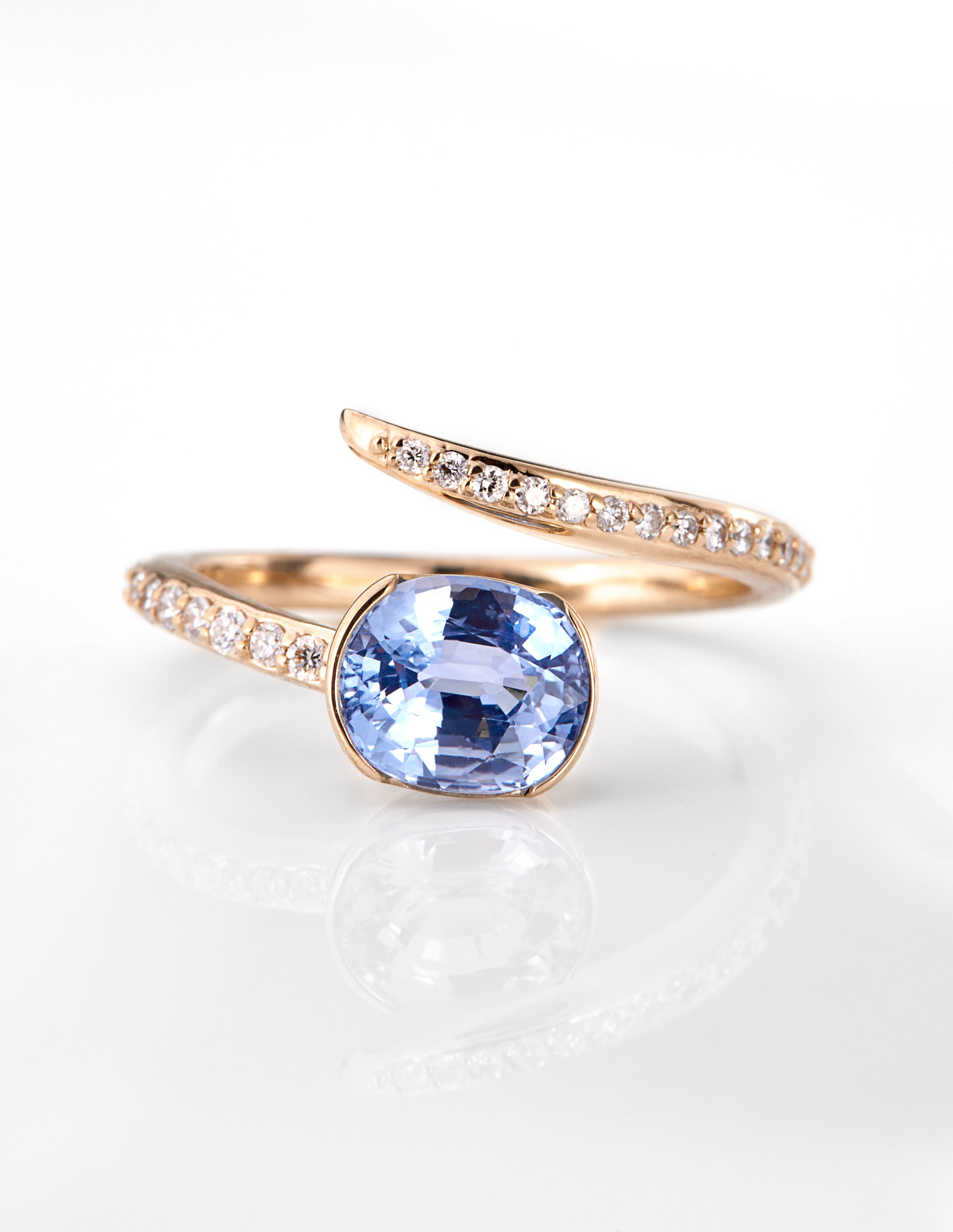 Close-up of the Chorthip Arisa Serpentine Engagement Ring featuring a unique serpentine design in silver with intricate detailing.