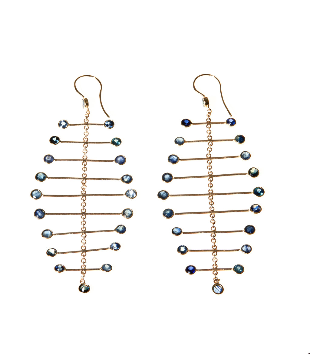 Pair of Arisa Azure Mobile Earrings by Chorthip featuring elegant silver hooks and vibrant blue gemstone accents.