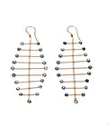 Pair of Arisa Azure Mobile Earrings by Chorthip featuring elegant silver hooks and vibrant blue gemstone accents.