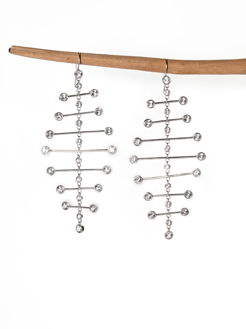 Chorthip Arisa Twilight mobile earrings featuring delicate hanging design with gemstone accents on a white background