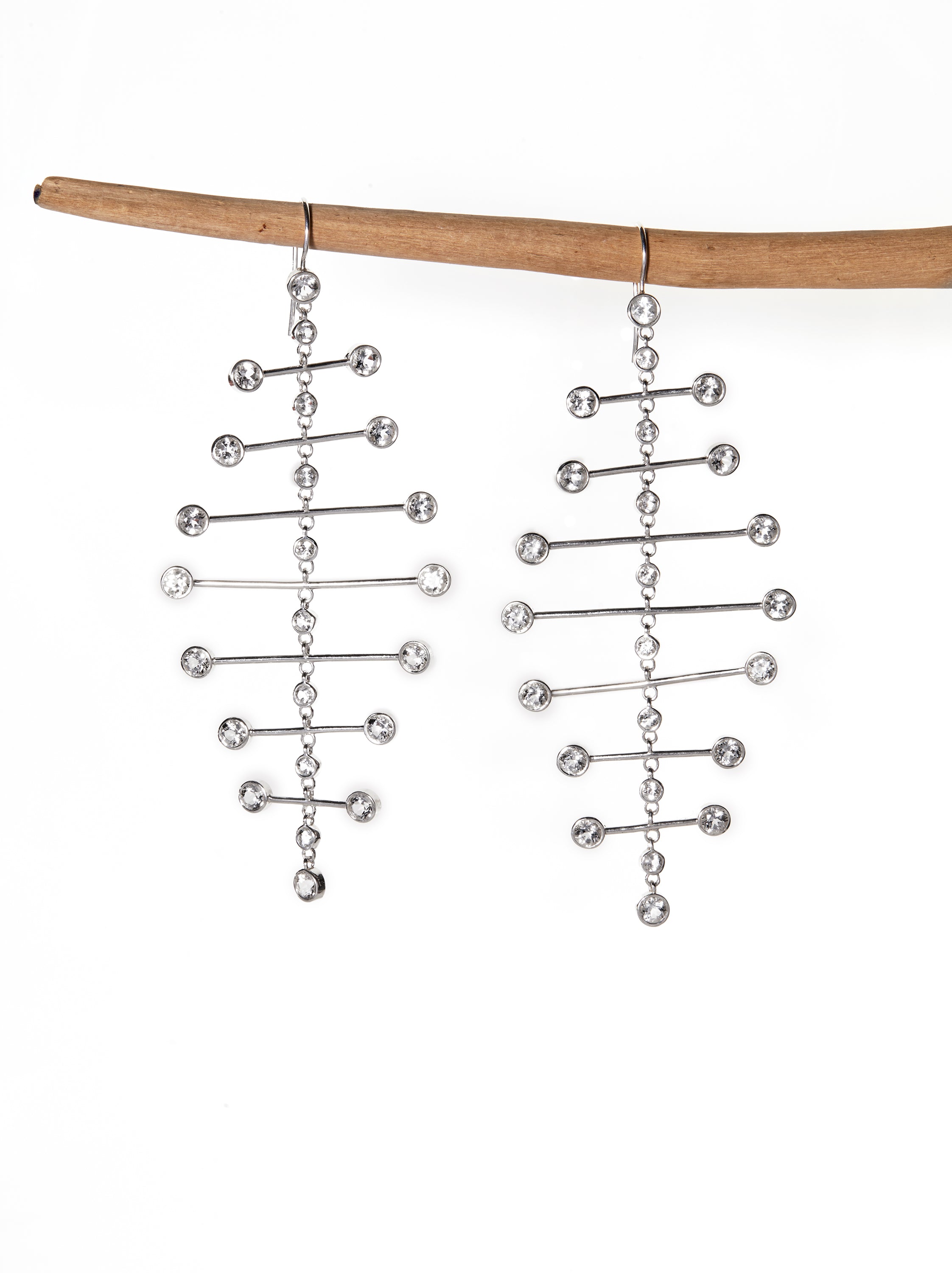 Chorthip Arisa Twilight mobile earrings featuring delicate hanging design with gemstone accents on a white background