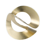 Chorthip Möbius Bangle featuring sleek, minimalist silver design with smooth curves and polished finish.