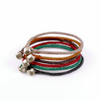 Silver Nugget Bracelet by Chorthip featuring irregular silver nugget charms on a delicate bracelet chain.