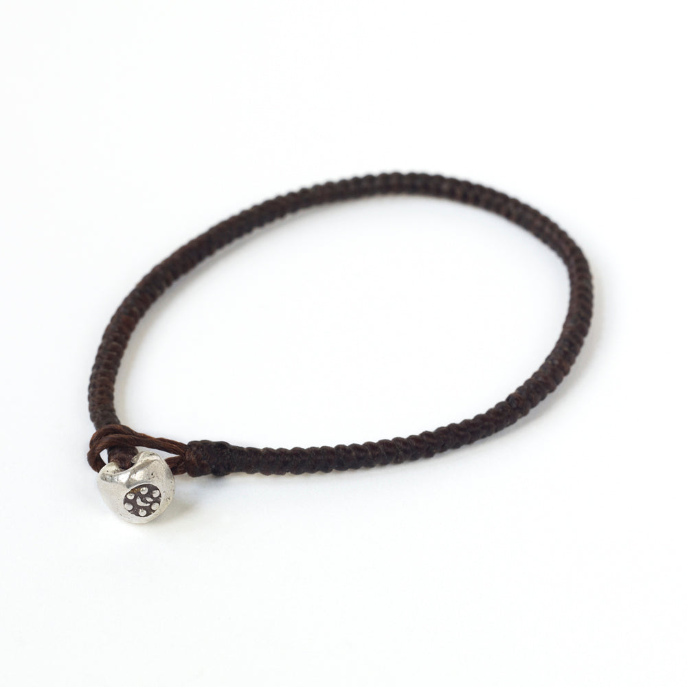 Silver nugget bracelet by Chorthip featuring smooth, rounded silver nuggets on a delicate chain.