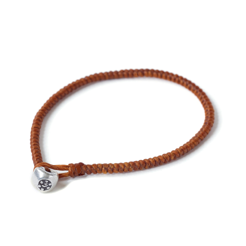 Silver Nugget Bracelet by Chorthip featuring irregular silver nugget charms on a delicate chain.