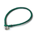 Silver Nugget Bracelet by Chorthip featuring green gemstone nuggets and a sleek silver clasp on a white background.
