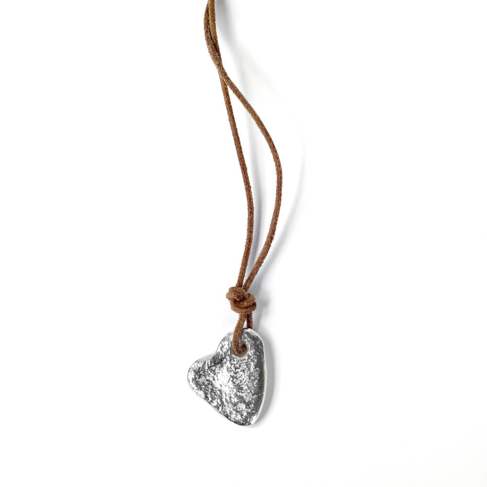 Chorthip stone heart pendant with a polished, natural stone heart shape hanging from a silver chain.
