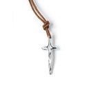 Gold cross pendant from Chorthip featuring a detailed design, hanging on a delicate chain, close-up view of the jewelry.