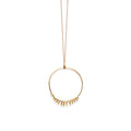 Closeup of Chorthip Helix Circle Pendant showing its spiral design and polished silver finish on a plain background.