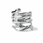 Shiny silver Raindrop Ring by Chorthip featuring a large teardrop-shaped gemstone design on a sleek band.