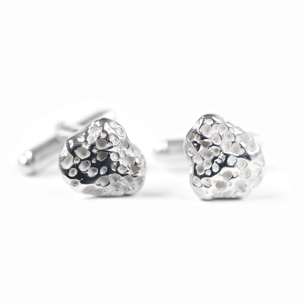 Chorthip Lava Stone cufflinks with polished black lava stone and silver-tone setting, stylish men's accessory.