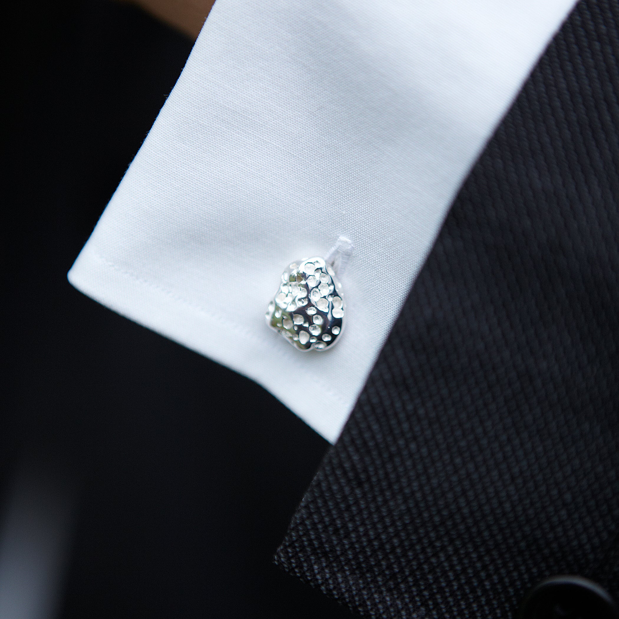 Chorthip Lava Stone cufflinks with round black volcanic stone and silver-tone setting, stylish men's accessory.