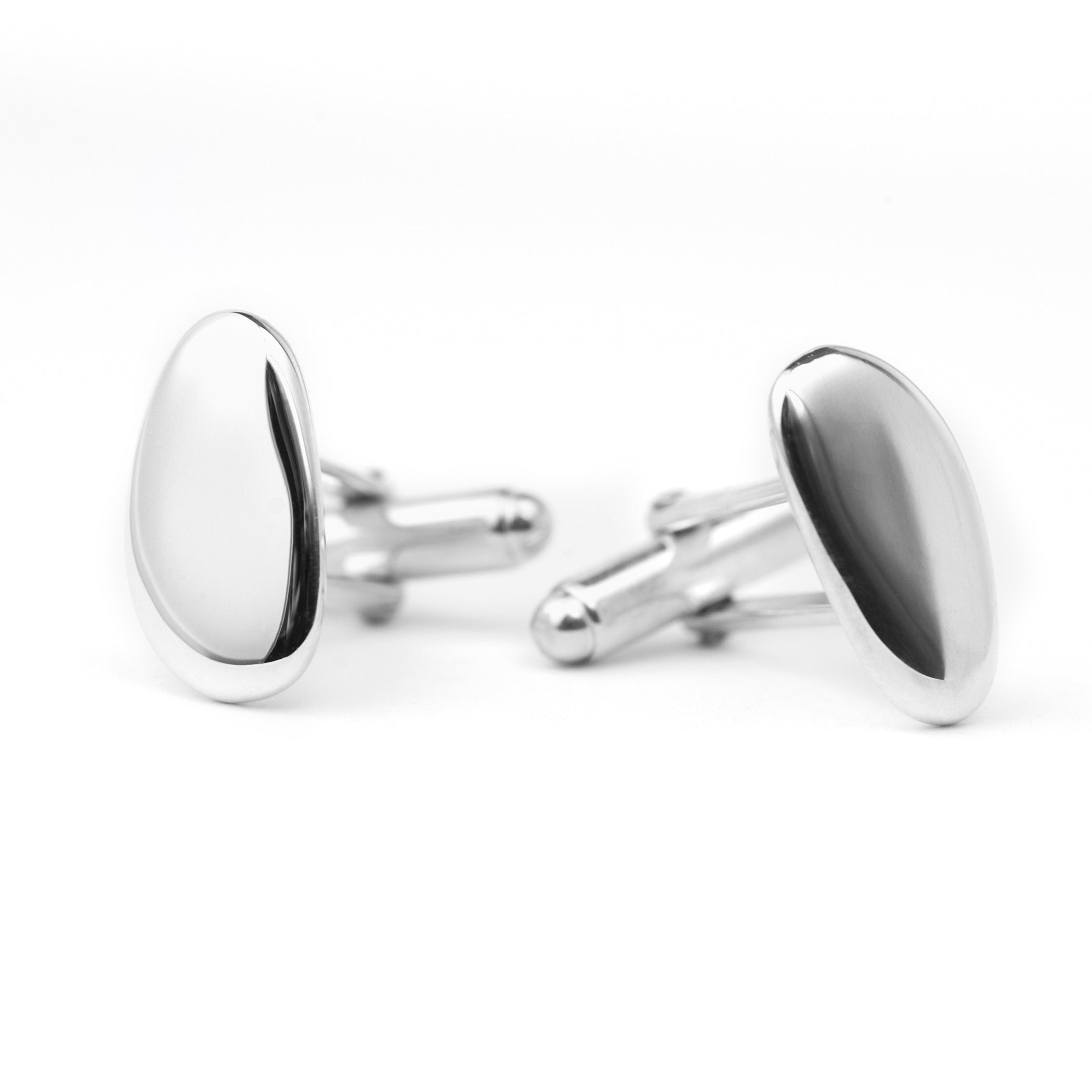 Chorthip Pebble Stone cufflinks with textured pebble design, polished silver finish, and classic round shape.