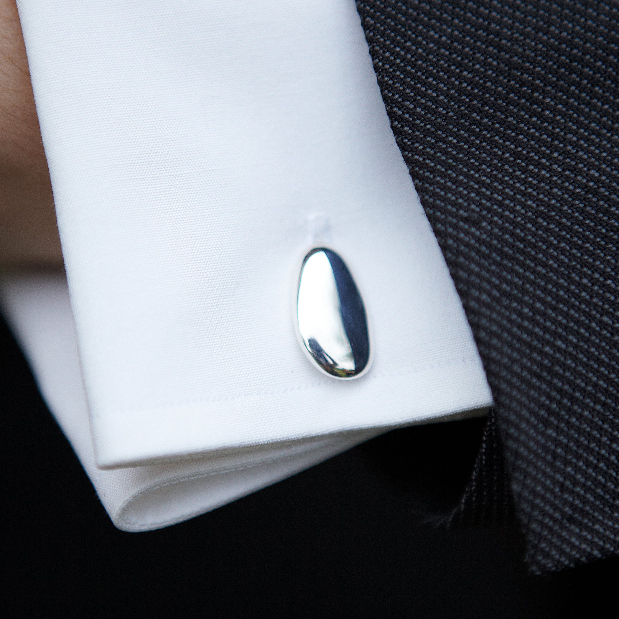 Chorthip Pebble Stone cufflinks featuring smooth, rounded stone design in a polished metal setting for a sophisticated look.