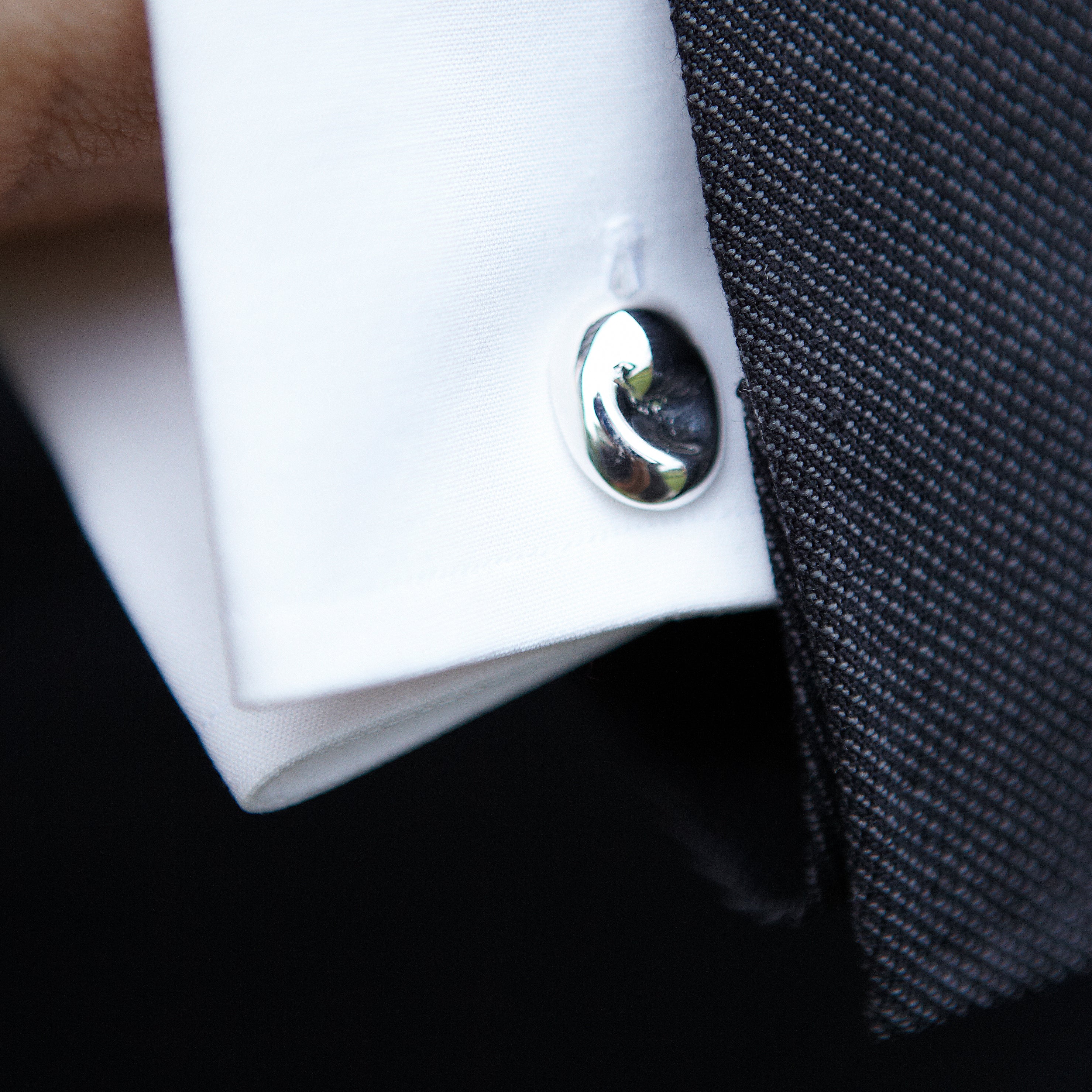 Chorthip Eye of The Sea shell cufflinks featuring ocean-inspired design with polished silver finish.