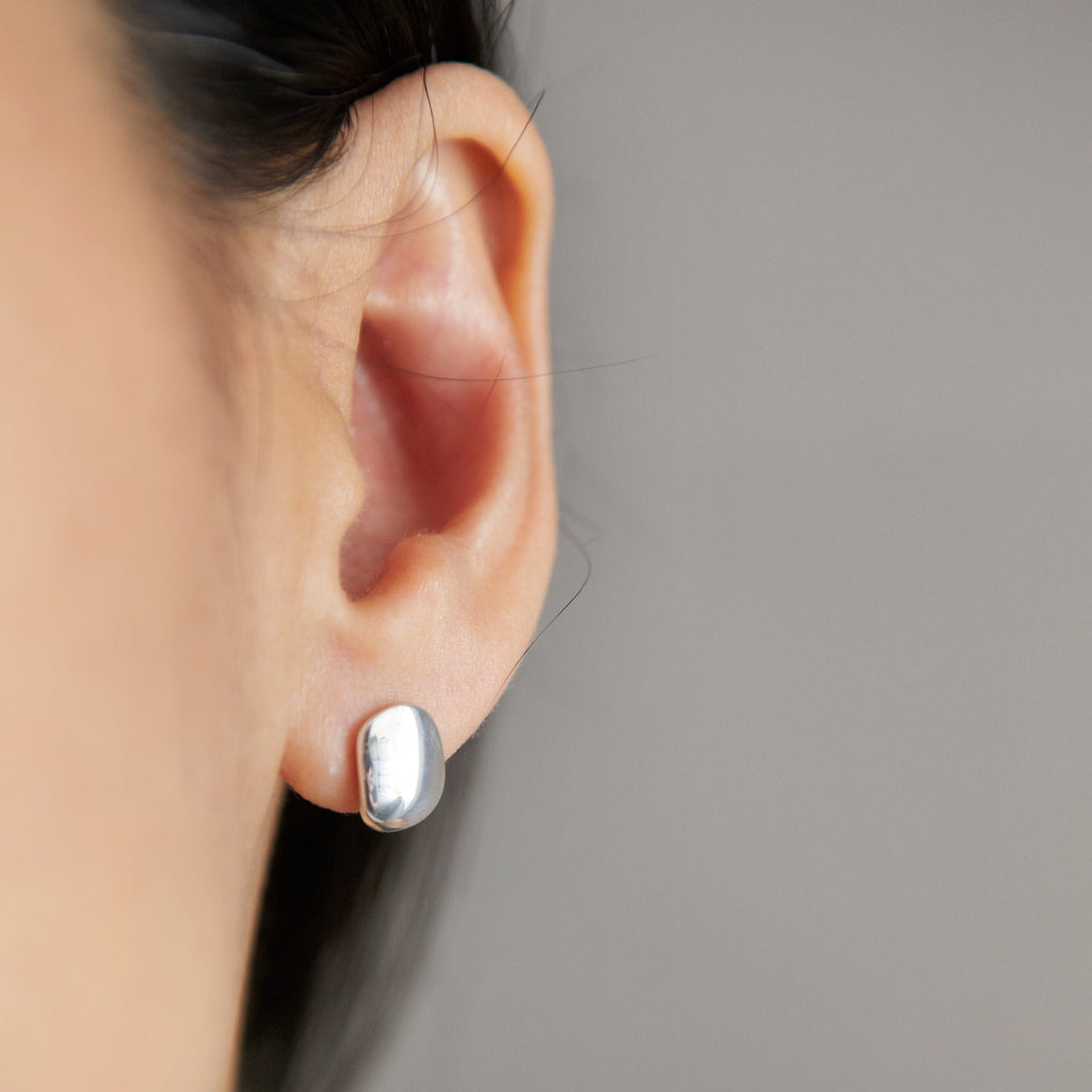 Chorthip pebble stone earrings featuring smooth, rounded stone design in neutral tones, perfect for casual or elegant wear.