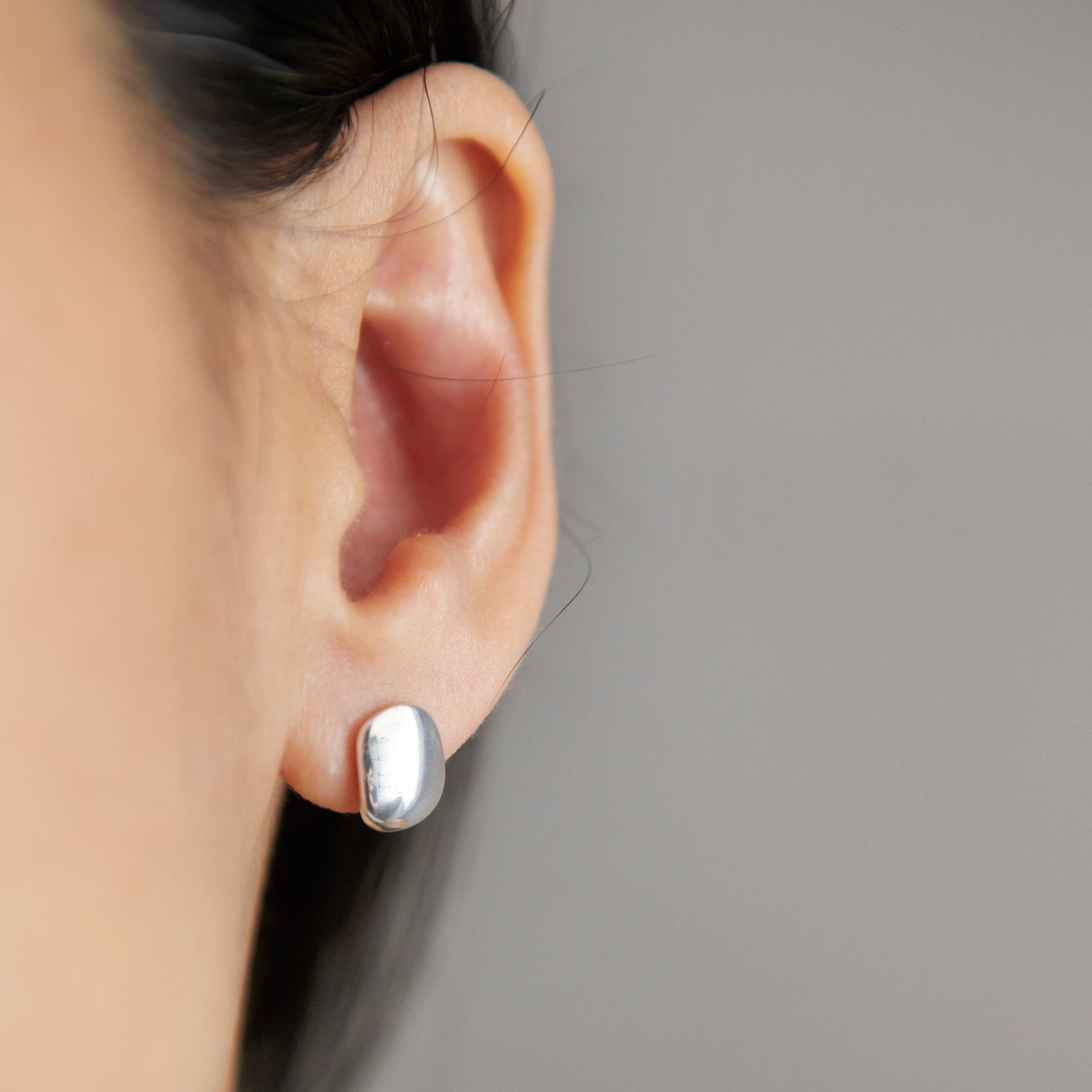 Chorthip pebble stone earrings featuring smooth, rounded stone design in neutral tones, perfect for casual or elegant wear.
