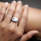 Close-up of Chorthip Pebble Stone Ring featuring smooth, rounded pebble design in a natural, earthy style.