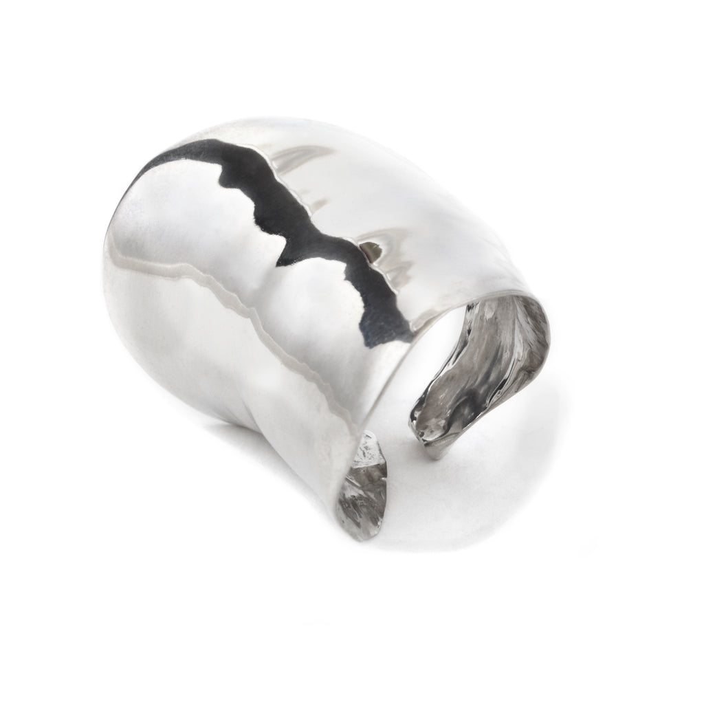 Silver Leaf Ring by Chorthip featuring a delicate leaf design, showcasing a sleek silver band with intricate leaf details.