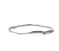 Silver Raindrop Bangle by Chorthip featuring a sleek, curved design with shiny raindrop-shaped accents on a smooth band.
