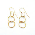 Chorthip Triple Link Earrings showing three interconnected silver hoops on a plain background.