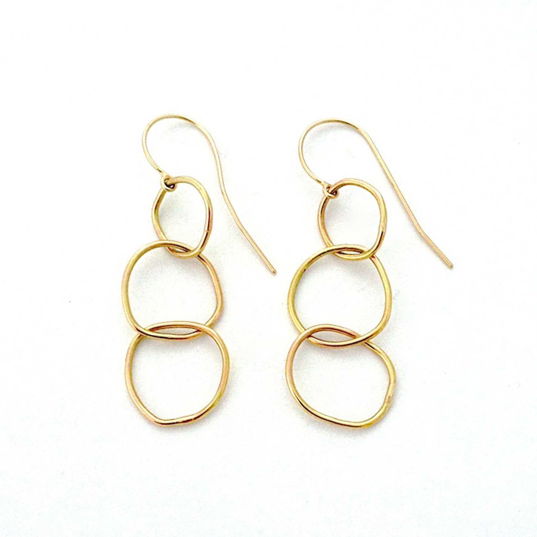Chorthip Triple Link Earrings showing three interconnected silver hoops on a plain background.