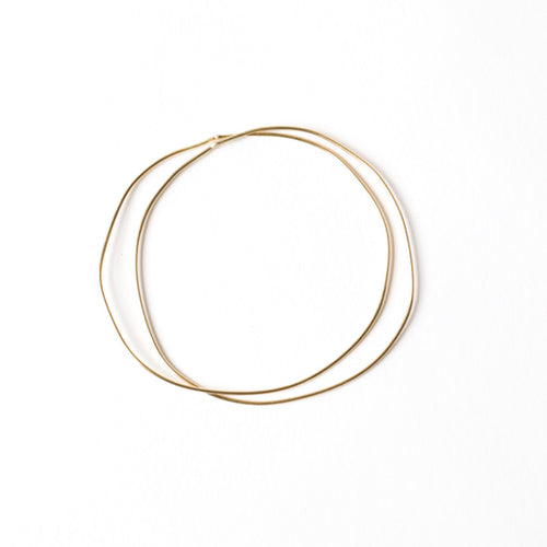 Chorthip Double Link URS Gold Bangle with intertwined wave design, elegant jewelry accessory for women